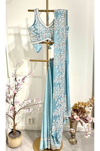 Powder blue saree with readymade blouse 